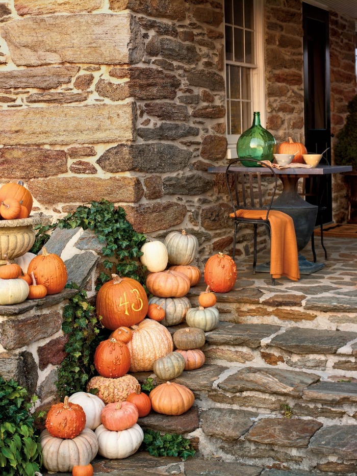 outdoor stone porch pumpkins decoration idea 