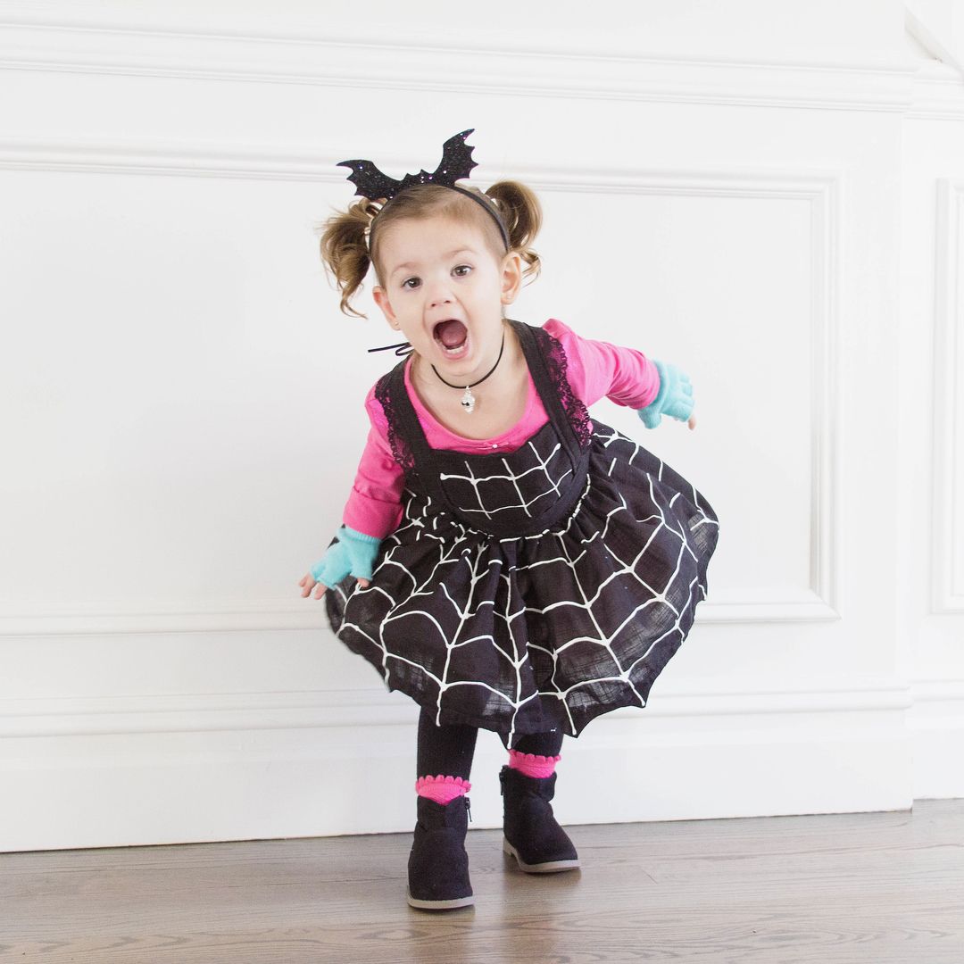 Little girl vampirina costume with spider web dress pink shirt and black shoes