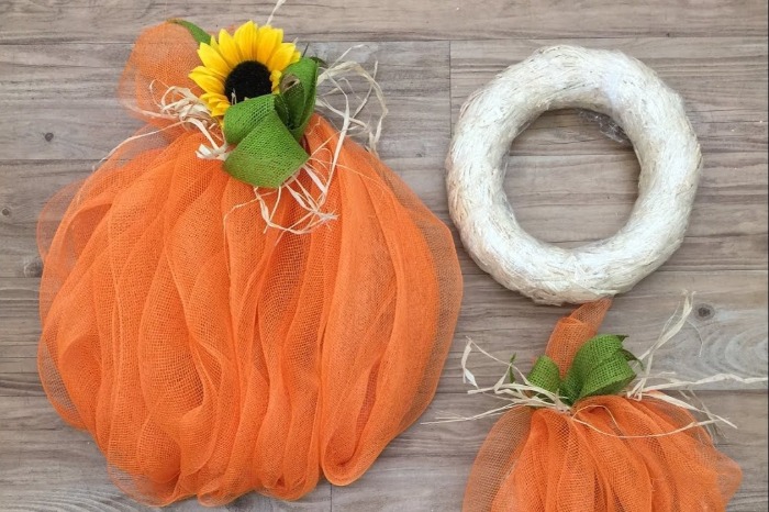 DIY Fall Wreaths deco mesh pumpkin on a table orange with flowers