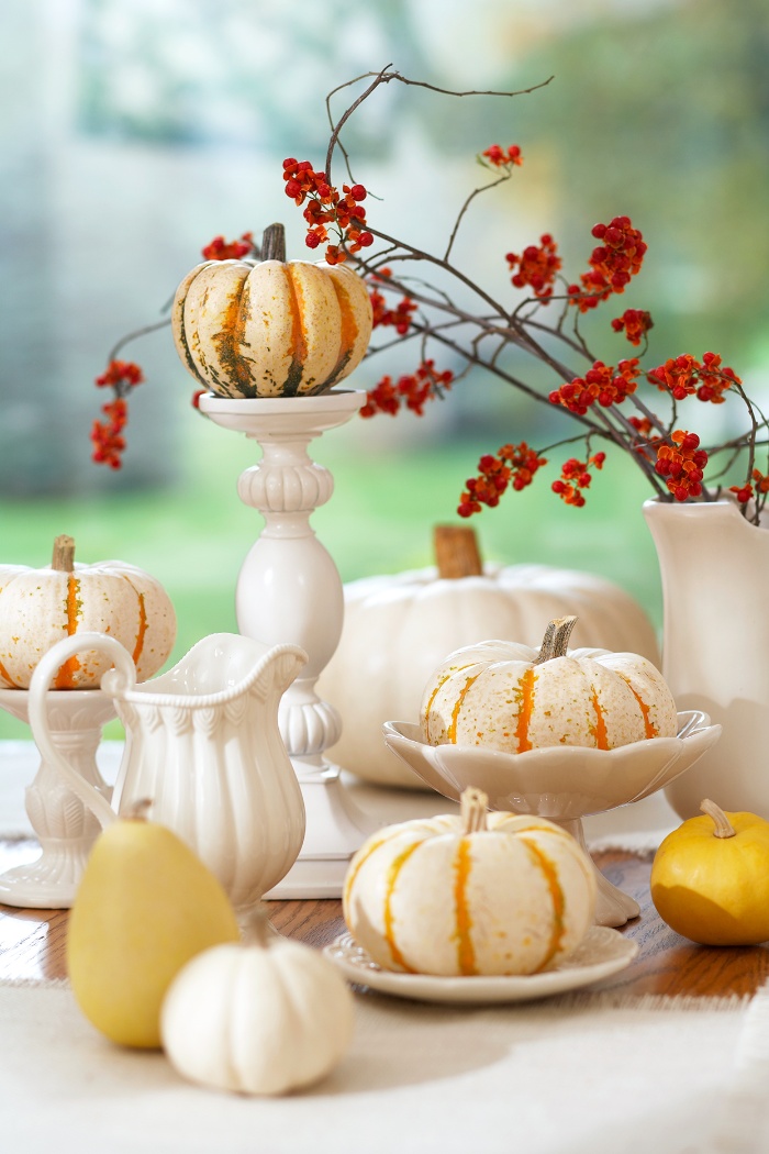 stylish table decor in white yellow and orange fall centerpiece