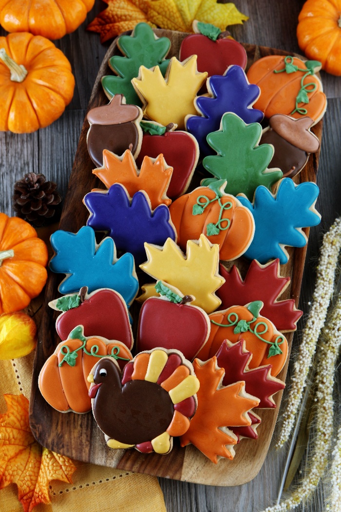 colorful thanksgiving cookies different colors and fall themed shapes