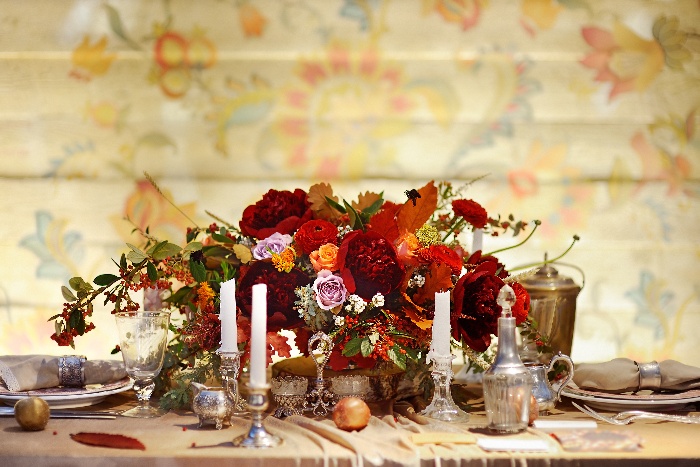 thanksgiving wedding decor stylish centerpiece in red and orange candles and vintage tableware