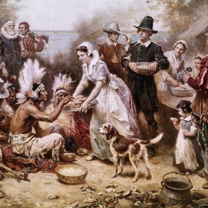 painting depicting thanksgiving celebration in the old times with the native indians