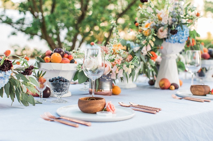 wedding table close up with flower decorations and stylish arrangement