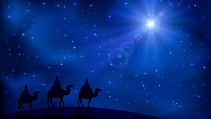 Christmas symbols the guiding star and the three kings on camels 