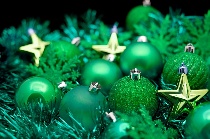 green christmas decorations starts baubles and garlands in different shaded of green