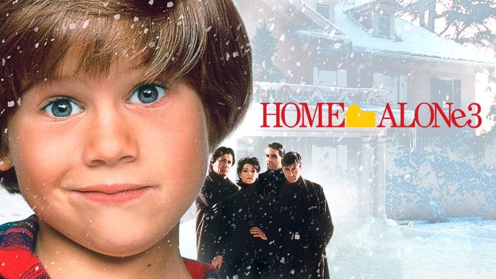 best christmas movies home alone 3 poster a young boy in front of a snowy home