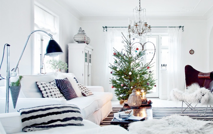 scandinavian secrets modern christmas decor in white and black with christmas tree cosy fur