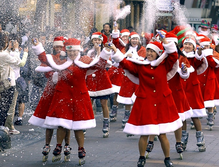 roller skating to mass christmas tradition women dressed in christmas suits roller skating to church