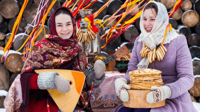 russian traditions two women outside in traditional russian clothes 