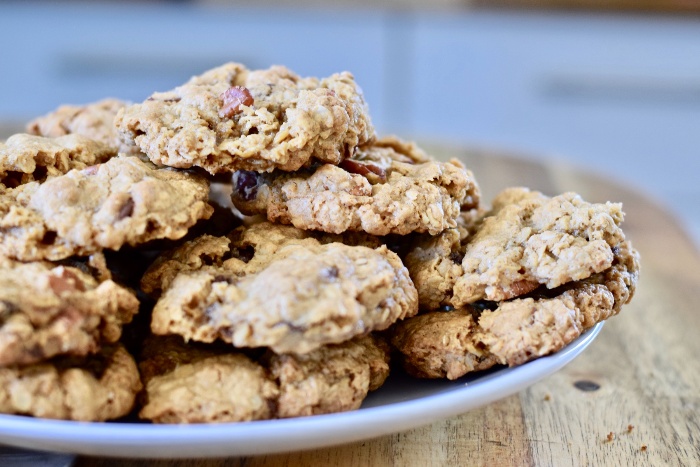 Oatmeal pecan cookies in a plate on a table