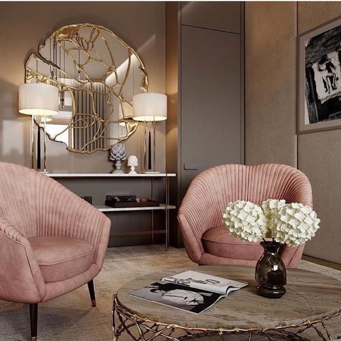 intuitive home decor luxurious room with pink chairs and golden accents