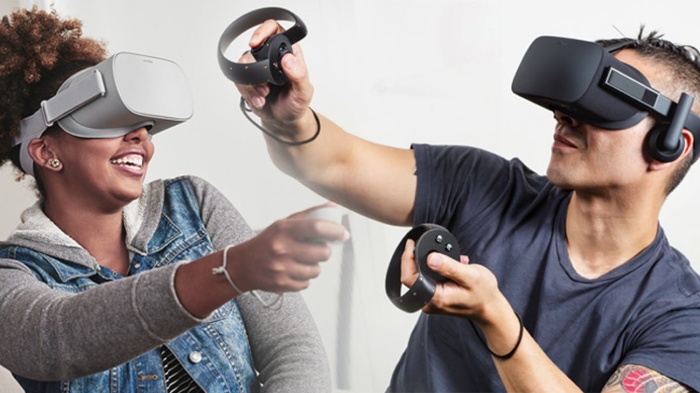 couple with a virtual reality set playing games
