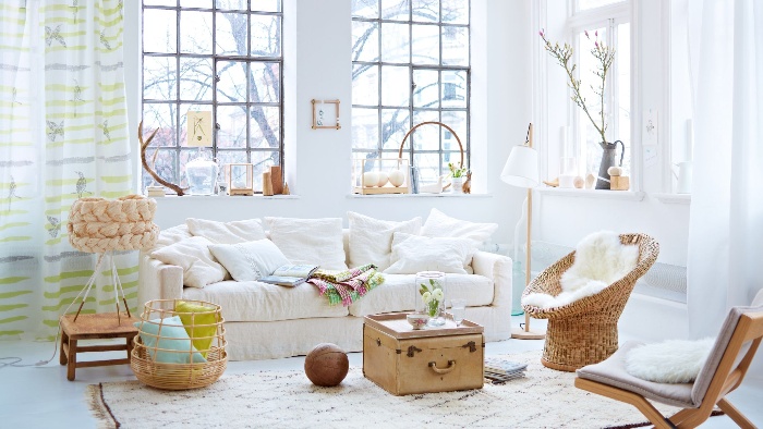 casual living room romantic retro decor in white with natural elements and large windows