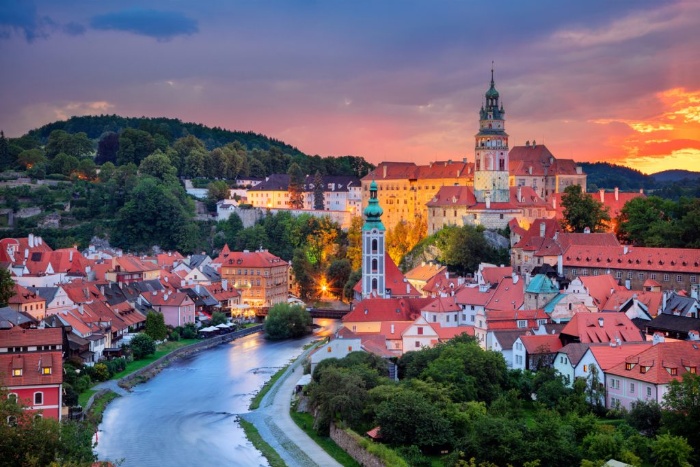 cesky krumlov small town in the evening river and clock towers