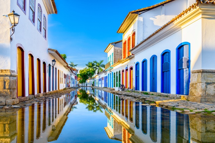 Paraty brazil small town with white houses and colorful doors water cannal