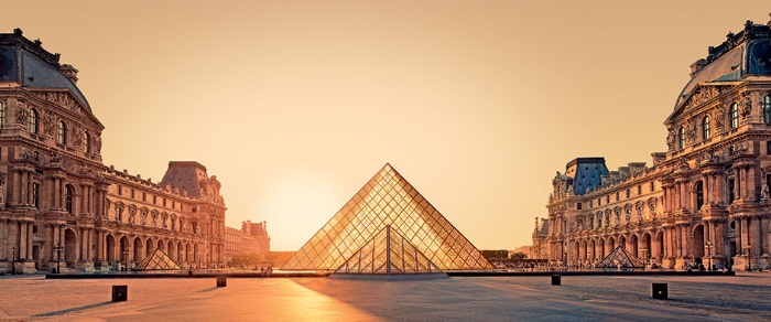 the louvre in paris at sunset