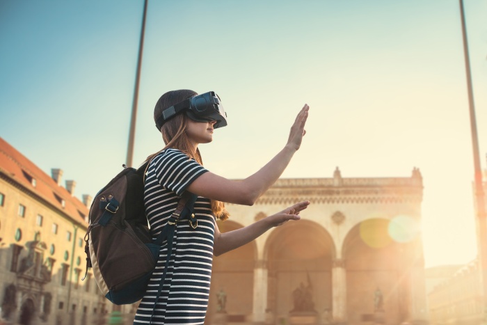 virtual travel girl with a backpack and vr glasses exploring a city