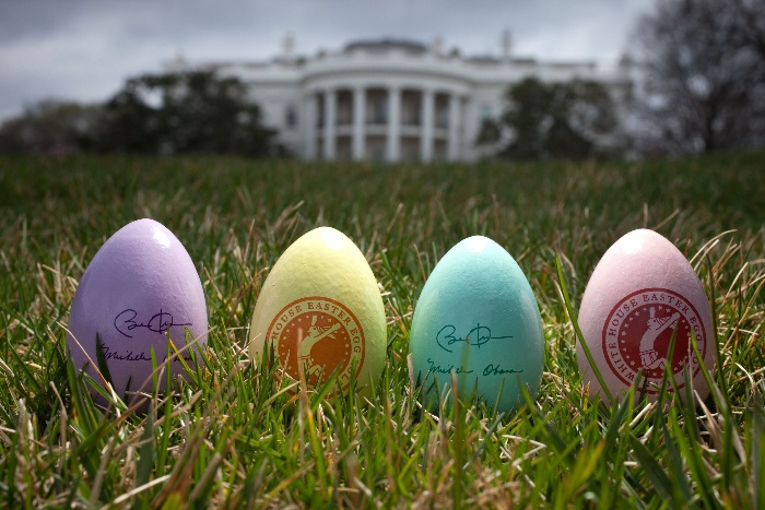 colored eggs with stamps on the lawn in front of the white house