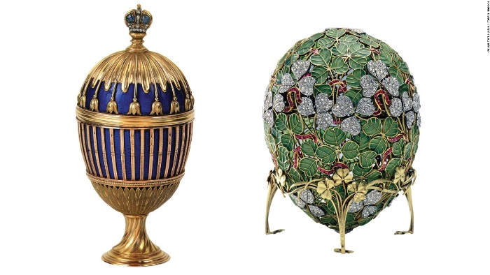 two gorgeous faberge eggs with precious stones and gold