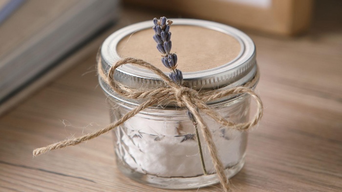 jar with soda and lavender fragrance decorated with a thread and lavender branch