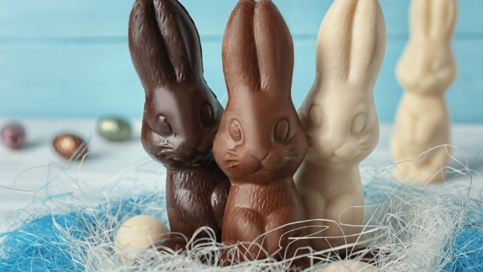 three bunnies from different chocolate white milk and dark 