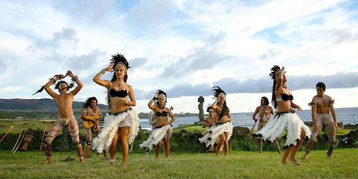 easter islands traditional dancing girls and boys in island costumes dancing outside