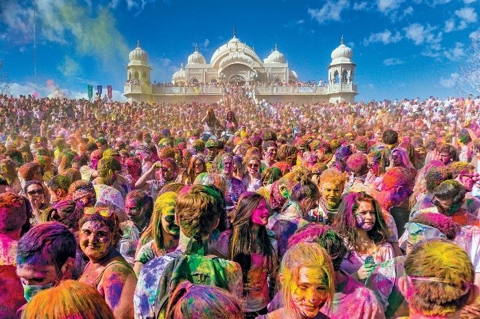 holi festival spign celebration in india full of people and colors