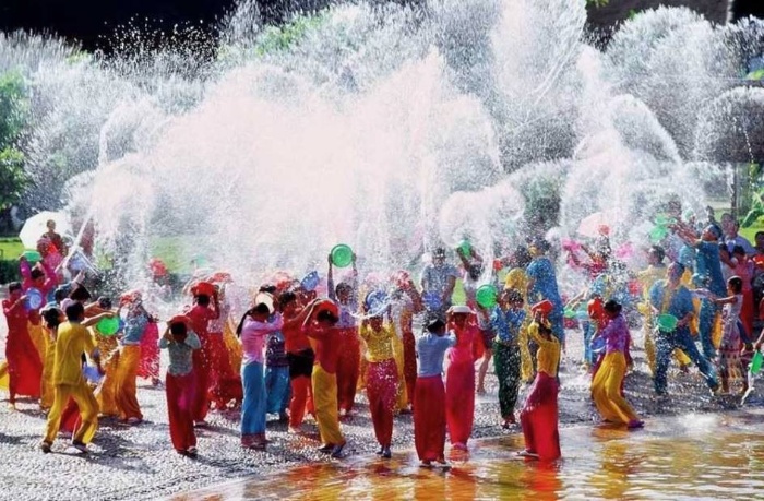 water festival thailand people in colorful clothes splashing water