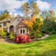 Panorama of suburban home on a sunny autumn afternoon