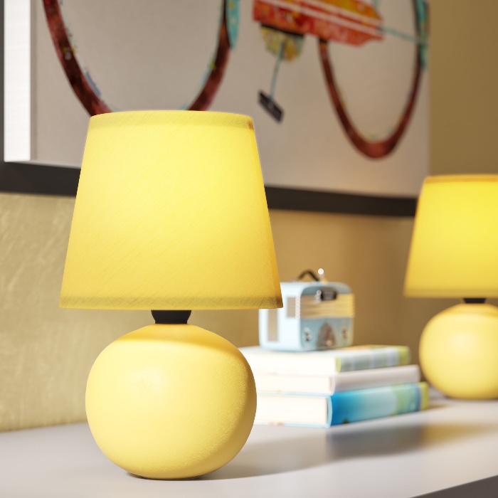 bright yellow desk lamps in a bedroom
