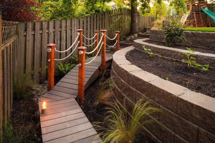 wooden design bridge pathway with stone walls and terraces