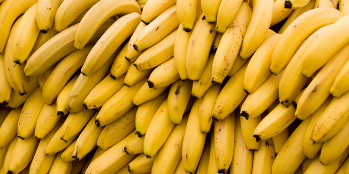 a pile of yellow ripe bananas 