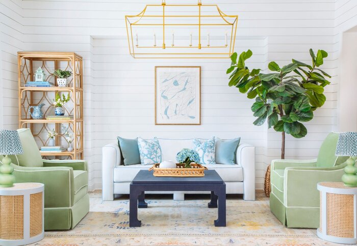 summer home design trend with blue and green accents metal elements and living plant