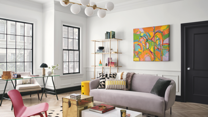 modern interior living room with colorful accents and artwork on the wall