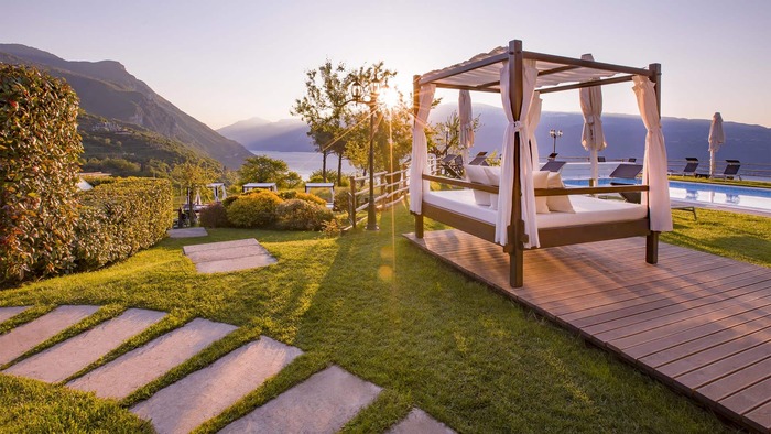 yard with a pool and panoramic view wooden gazebo around the pool