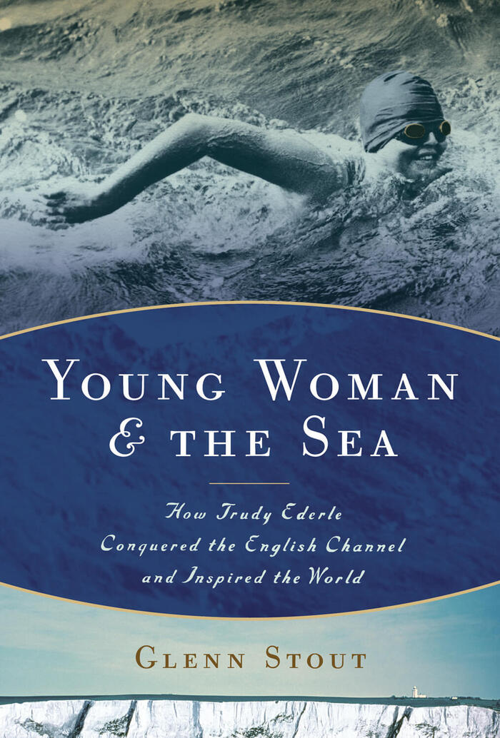 young woman and the sea book by glenn stout book cover in blue with a women swimming