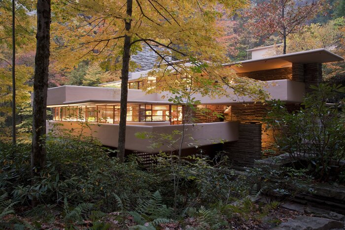 nature surrounding house with modern structure in fall greenery around
