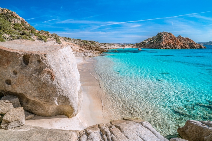 Sardegna island in Italy clear water and white sand rocks on the beach