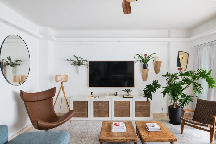 interior design living room interior with natural materials large tv on the wall and green living plants