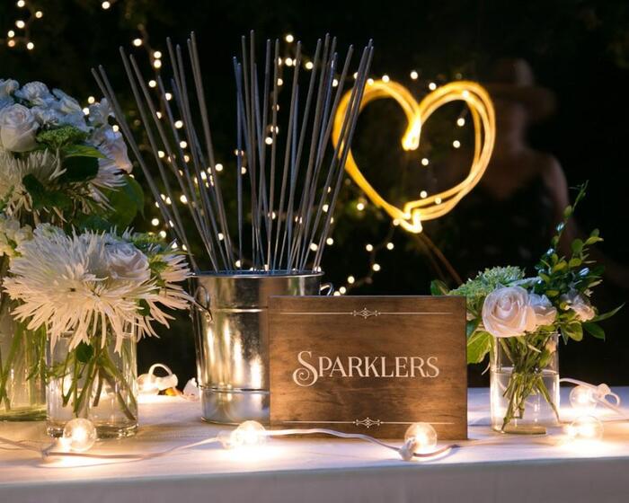 party sparklers beautifully decorated table with flowers and lights