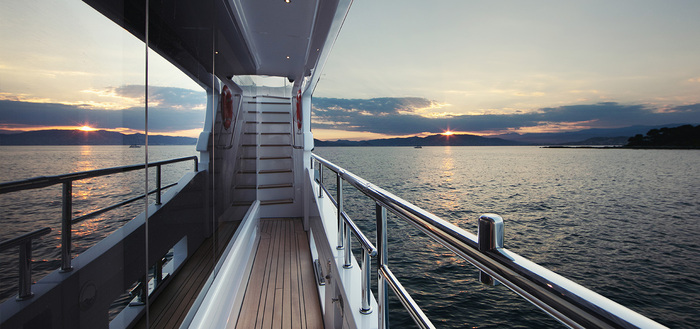 private yacht interior little corridor overlooking the sea with staircase in front