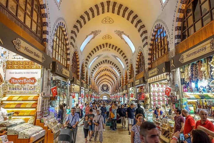 Spice Bazaar Istanbul interior arched roof and different stands with food