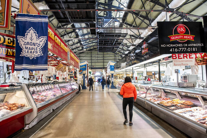  St. Lawrence Market empty with glass windows filled with food