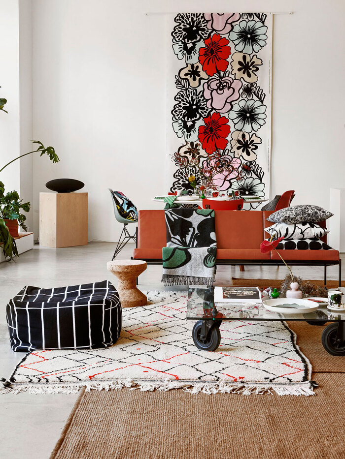 florals in the interior modern space with eclectic interior design florals on the wall colorful carpets and furniture