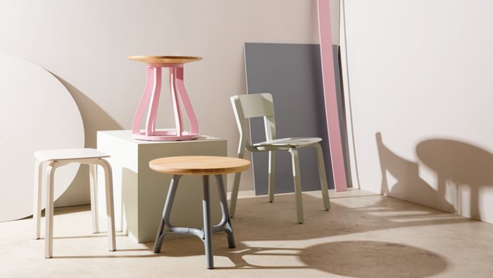 fast furniture in pastel colors in an empty bright colored room chairs and tables