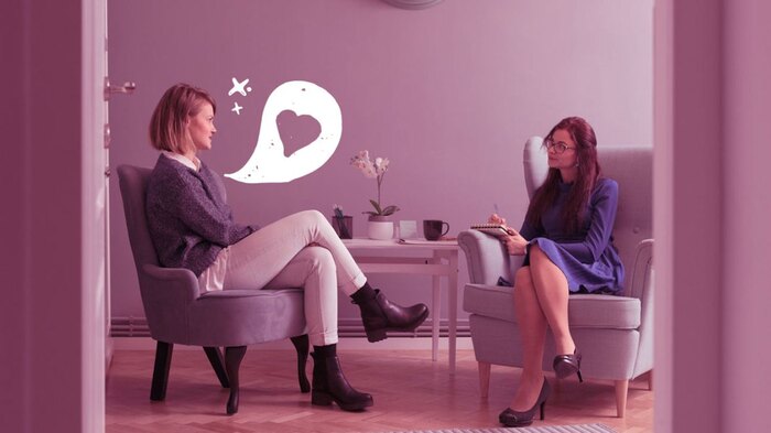 love talk two women sitting in an office talking to each other