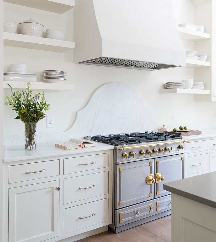 vintage kitchen trends exposed kitchen hoods in an all white kitchen with light blue oven