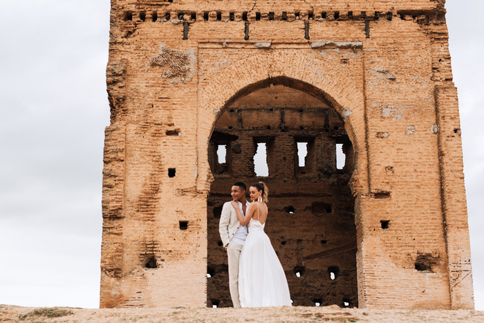 romantic places fez wedding photo of a couple in front of a ruin