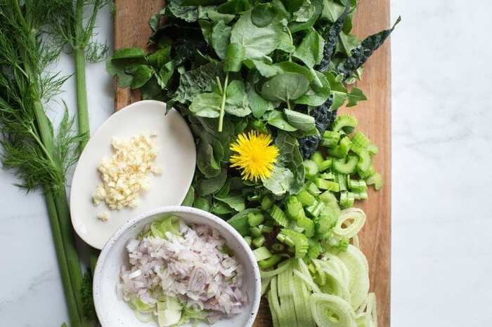 dandelion and other greens ingredients for salad preparation